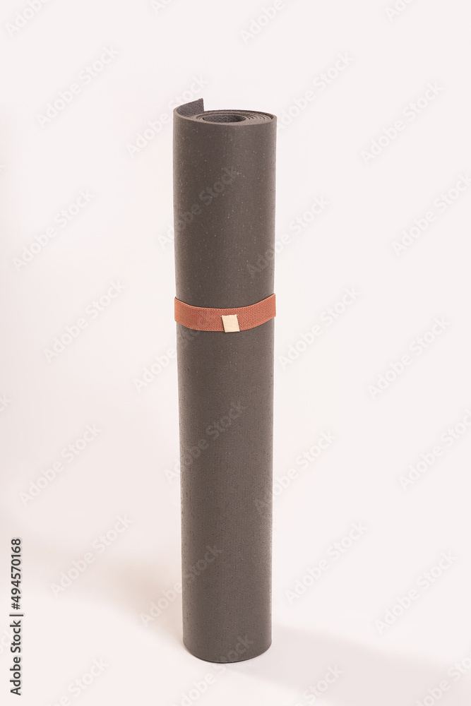 stand roll yoga mat on white and path stand roll yoga mat on white and path