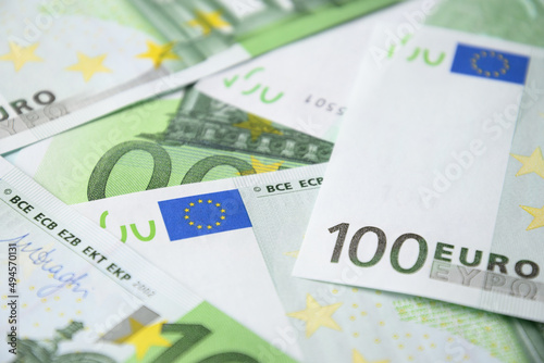 European money in banknotes of 100 euros. Euro currency banknotes background. Close up.