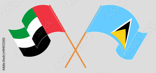 Crossed flags of the United Arab Emirates and Saint Lucia. Official colors. Correct proportion