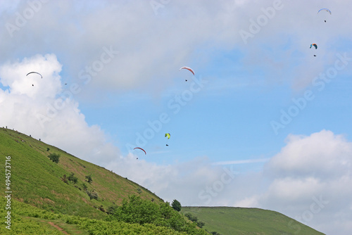 Wall Mural Paragliders flying above the ridge at Pandy, Wales