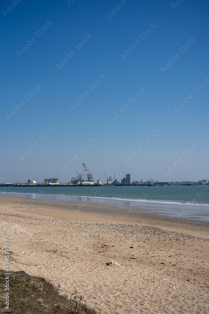 View of La Pallice, the trade port of La Rochelle. freight ships and cranes in the trade port