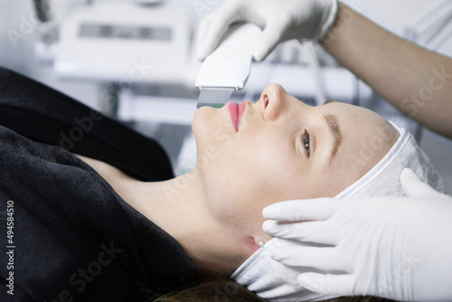 Facial treatment at beauty salon