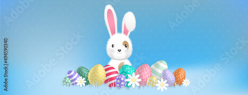 a cute white bunny behind colored eggs and flowers on a blue background