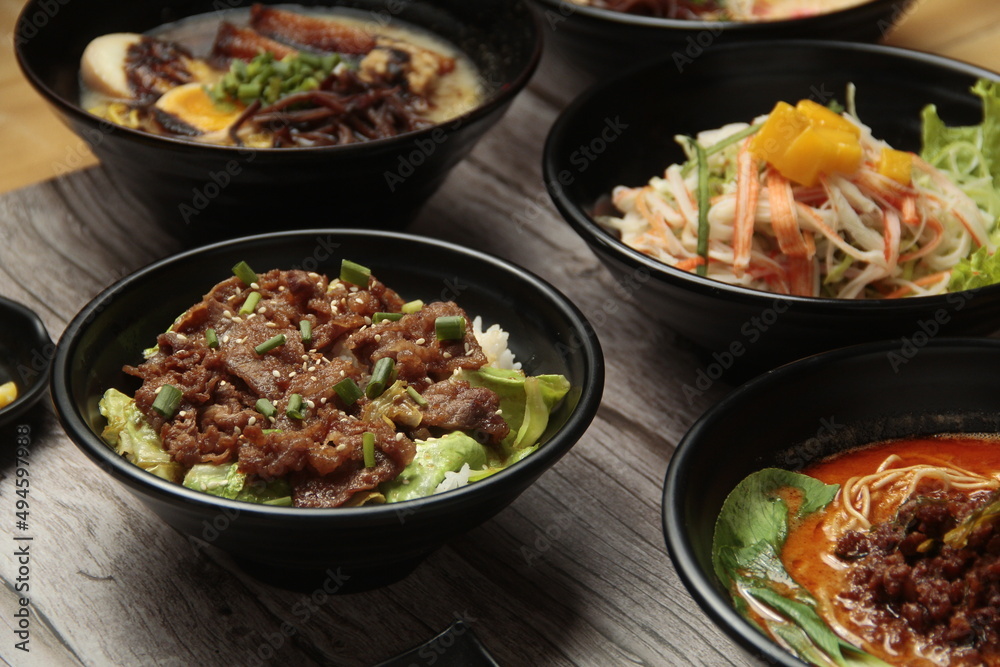 reshly cooked Gyudon or beef briskets topped over rice and other Japanese food reshly cooked Gyudon or beef briskets topped over rice and other Japanese food