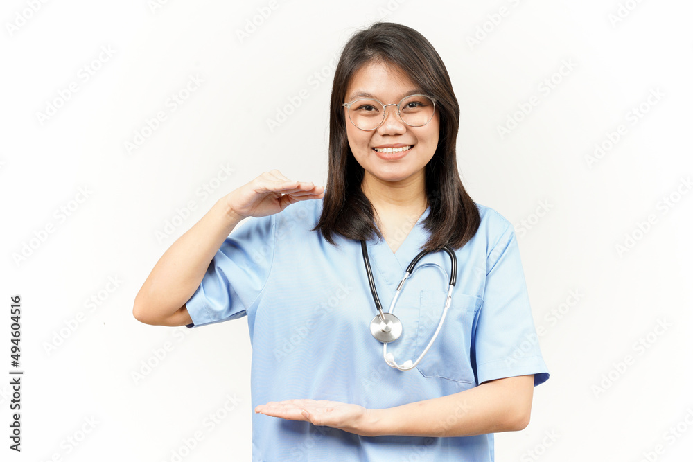 Measuring and Showing Big Sign Product Of Asian Young Doctor Isolated On White Background Measuring and Showing Big Sign Product Of Asian Young Doctor Isolated On White Background