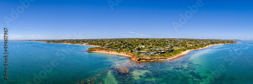Aerial shot of Daveys Bay Pelican Point, Mount Eliza coastal seascape with turquoise sea and clear blue sky aerial panoramic photo