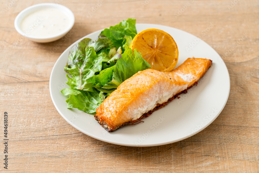 fried salmon steak with lemon and vegetable fried salmon steak with lemon and vegetable