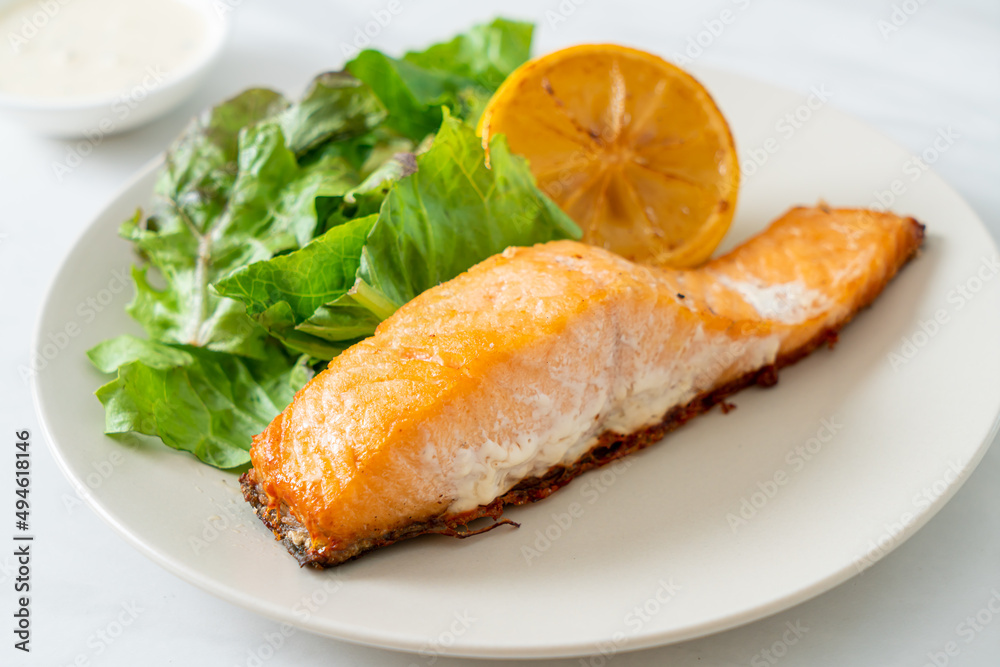 fried salmon steak with lemon and vegetable fried salmon steak with lemon and vegetable