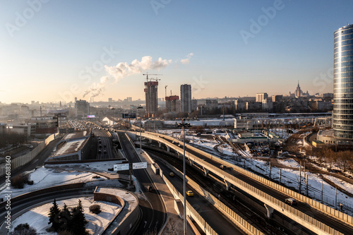 urban industrial landscape in the morning at sunrise shot from a drone 