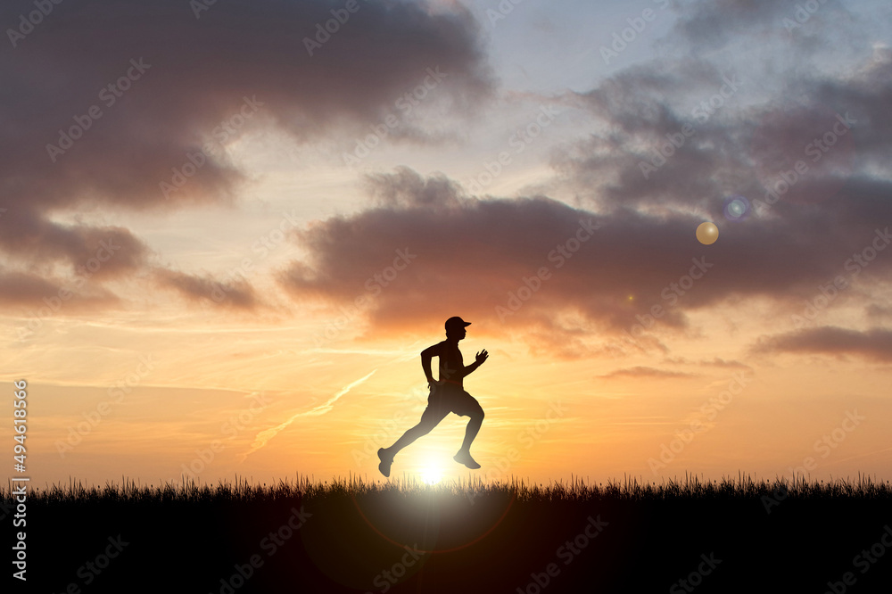 Running man silhouette in sunset time.  silhouette for a runner training in the evening. Sunsets