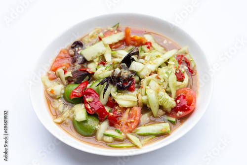 Spicy cucumber salad in plate