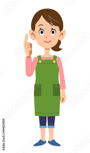 要点を解説するエプロンを着用した女性
