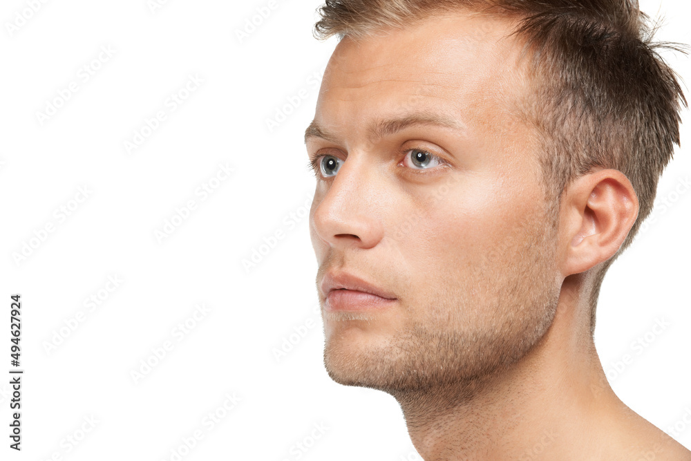 Focused on the future. Studio shot of a young man isolated on white. Focused on the future. Studio shot of a young man isolated on white.