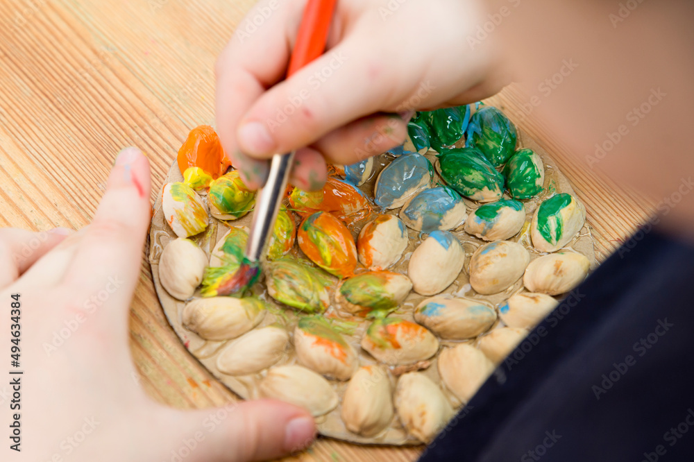 Painting of natural goods. Child's drawing with a brush on touch surfaces glued to paper. Play at home. DIY tasks for kids. Activities for little ones. Sensory education.
