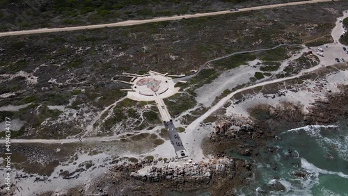 Cape Aghulas is the Southern most point of Africa and is marked by a large Africa monument. It is where the Indian and the Atlantic Ocean meet. photo