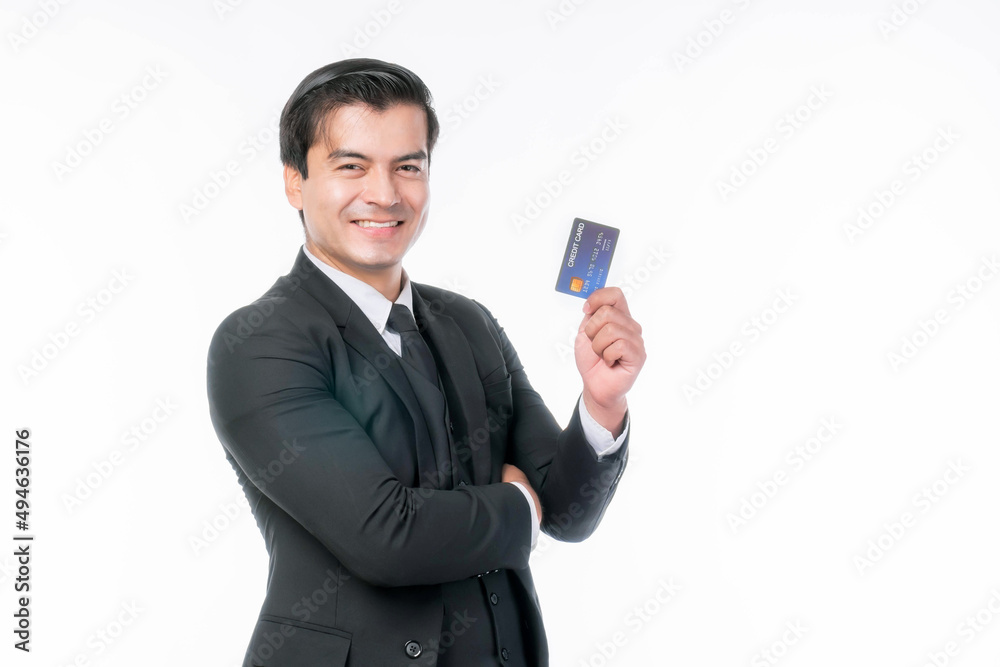 Portrait working Asian business handsome man ware suit showing credit card for payment shopping online , paying by credit card online shopping e-commerce telemarketing concept Portrait working Asian business handsome man ware suit showing credit card for payment shopping online , paying by credit card online shopping e-commerce telemarketing concept
