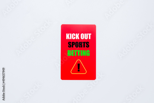 A picture of red card written kick out sports betting on white background. War against sports betting