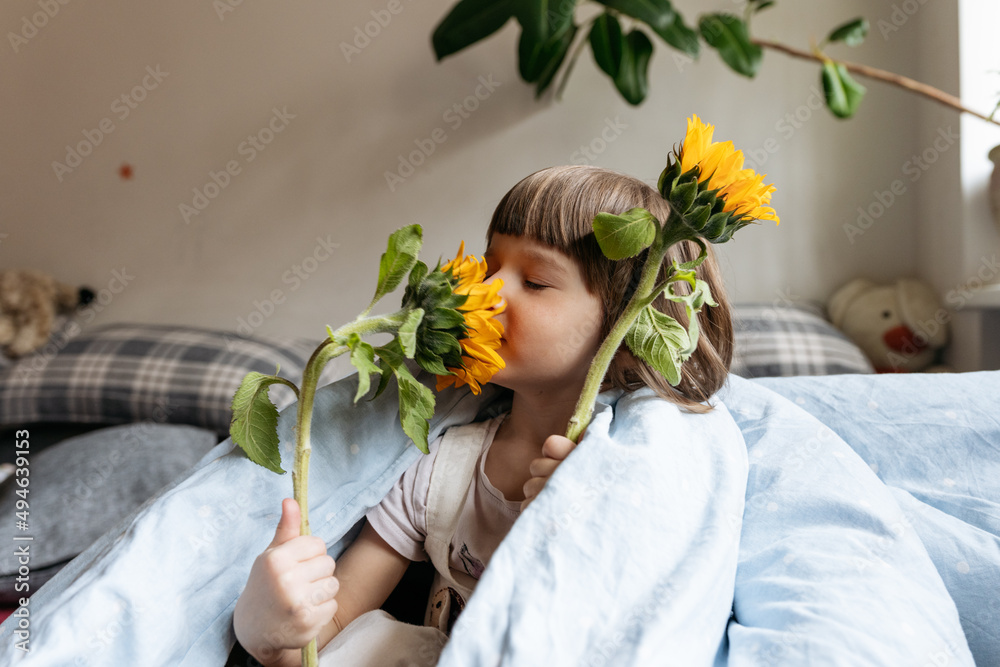 custom made wallpaper toronto digitalPortrait of a toddler girl holding sunflowers