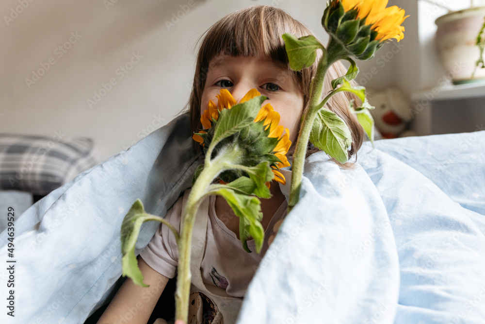 custom made wallpaper toronto digitalPortrait of a toddler girl holding sunflowers