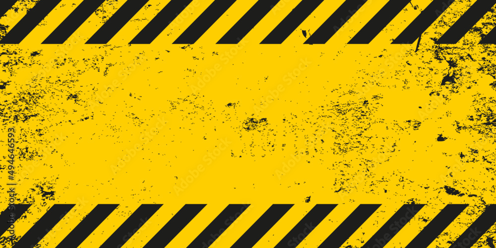 © Hero Design - Dirty old grunge black and yellow warning striped line background template. Construction safety sign banner