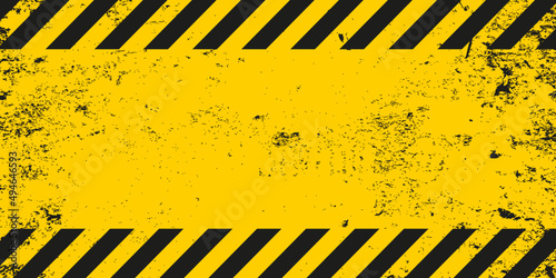 Dirty old grunge black and yellow warning striped line background template. Construction safety sign banner