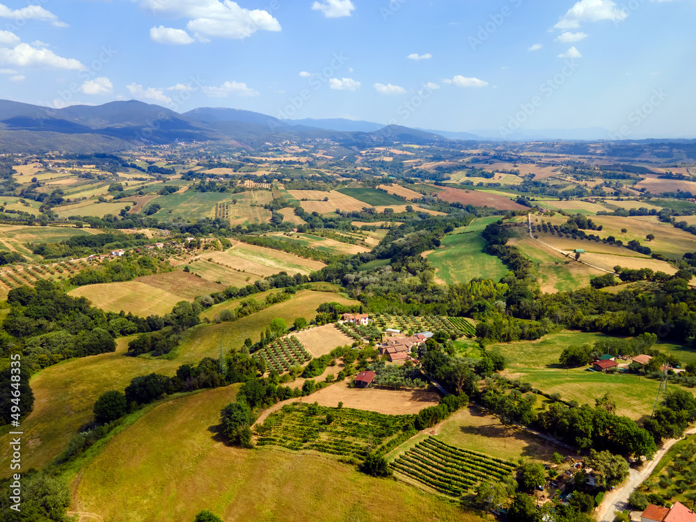 Spring view from a drone to green fields Tuscany Italy