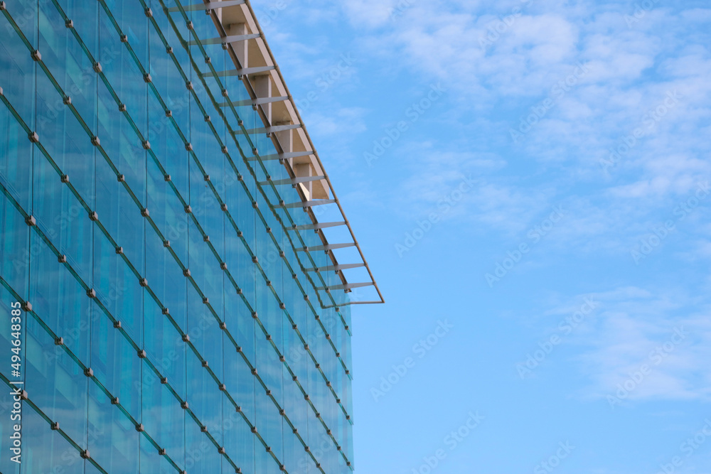 Modern beautiful building against the blue sky. Modern beautiful building against the blue sky.