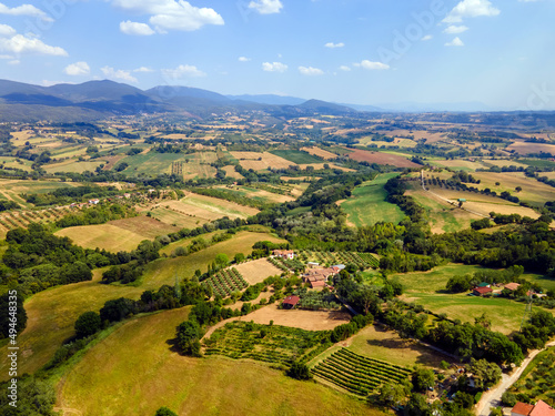 Spring view from a drone to green fields Tuscany Italy