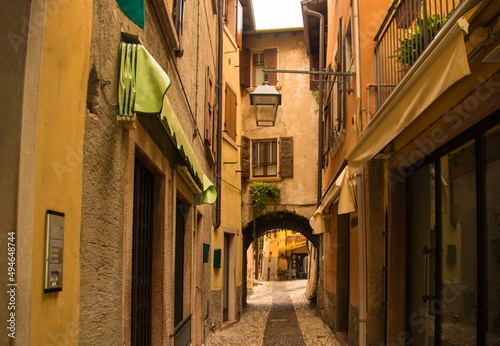 Fototapeta Naklejka Na Ścianę i Meble -  A quiet street in winter in the small town of Malcesine on the north shore of lake Garda, Verona Province, Veneto, north east, Italy
