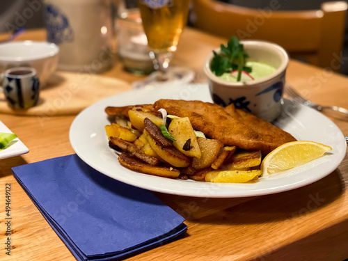 Принти на полотні Frankfurter Schnitzel, pork schnitzel with fried potatoes and green sauce