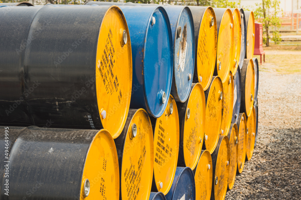 Oil Drums ,stack of oil drums,Used 55 gallon chemical drums in a storage yard awaiting recycling
