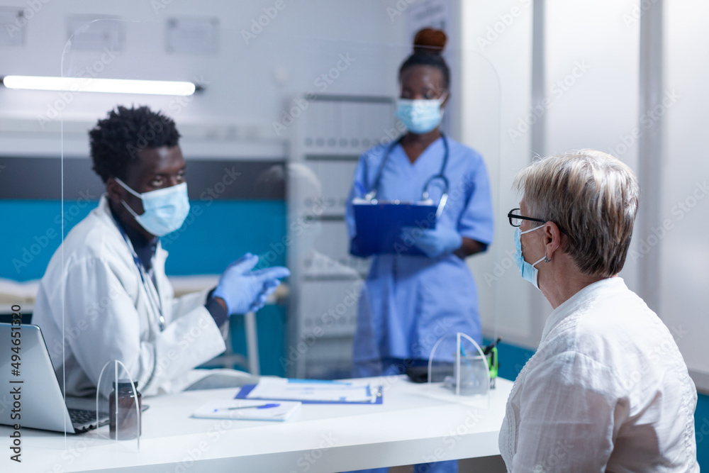 Clinic practitioner informing senior ill patient about hospital internment necessity. Nurse filling medical file report with personal information woman in order to hospitalize her and to offer