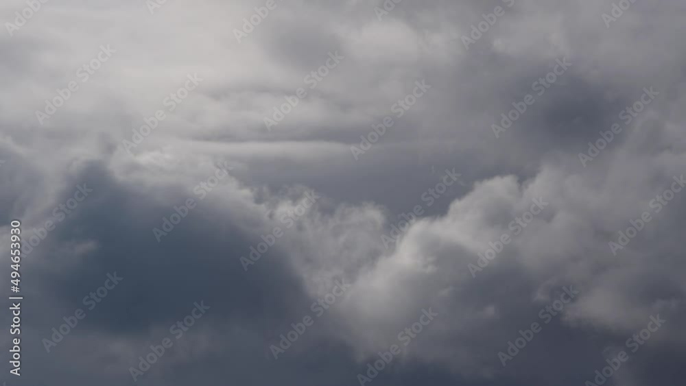 Close up dramatic eddy clouds moving in atmosphere - stormy weather conditions