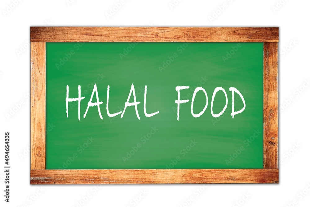 HALAL FOOD text written on green school board. HALAL FOOD text written on green school board.