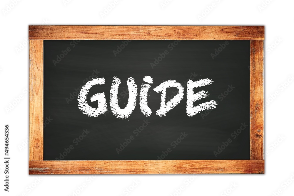 GUIDE text written on wooden frame school blackboard. GUIDE text written on wooden frame school blackboard.