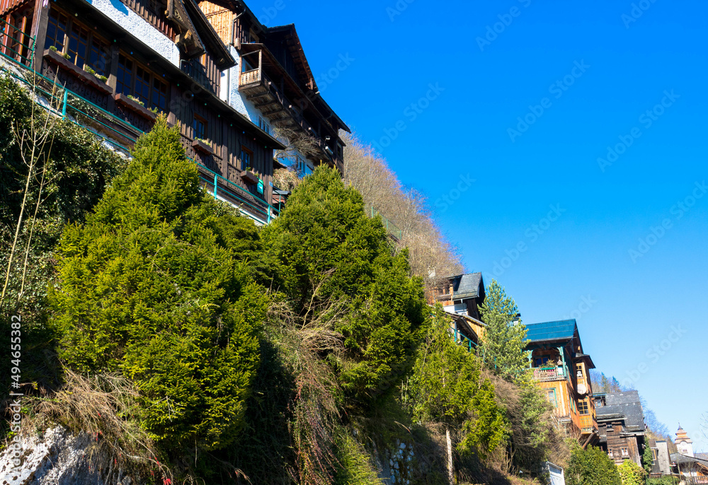 Traditonal houses in mountain village Hallstat near lake and Alps. UNESCO heritage. Upper Austria, Europe