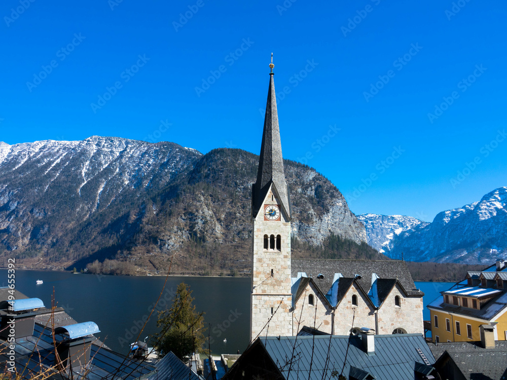 Panoramic view of the famous Hallstatt mountain village and the parish church of Maria Himmelfahrt in the Austrian Alps Salzkammergut, Hallstatt, Austria