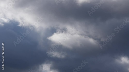 Close up clouds moving in atmosphere - stormy weather conditions photo