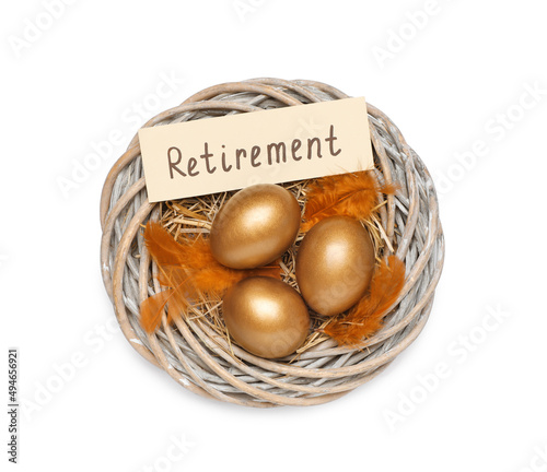 Golden eggs and card with word Retirement in nest on white background, top view. Pension concept