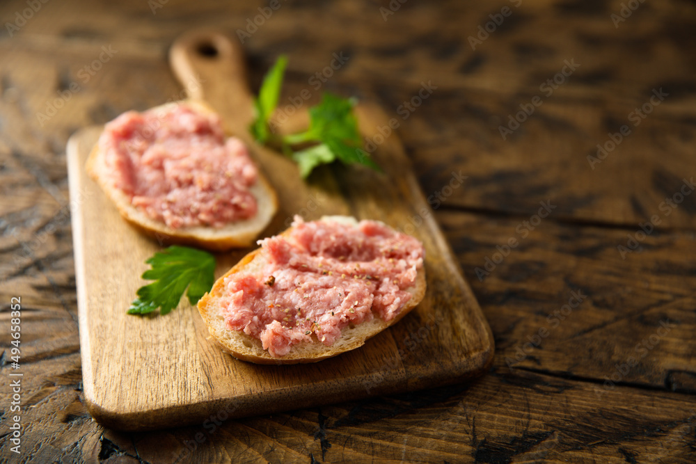 Traditional pork pate or sausage on a white bread