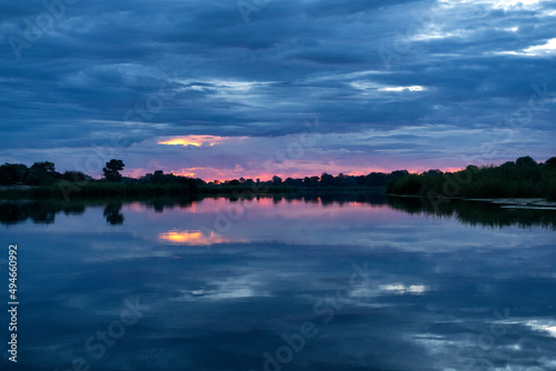 Sunset on the Okavango River between Namibia and Angola