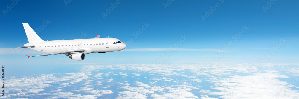 Panoramic wide angle view of sky horizon with clouds and jet commercial liner flying. Panoramic wide angle view of sky horizon with clouds and jet commercial liner flying.