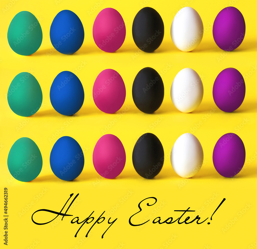 Colorful eggs on the yellow background. Easter, diversity, food concept