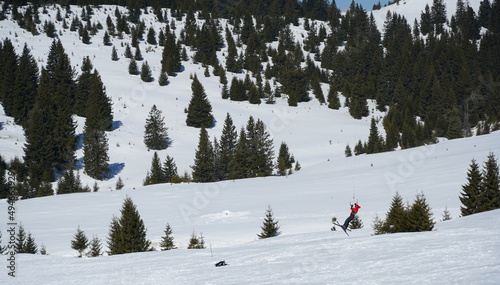 Kite Skiing. photo during the day in a beautiful winter setting.