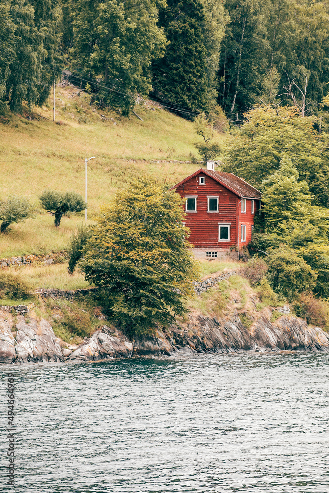 house on the fjord in norway on a rainy day house on the fjord in norway on a rainy day