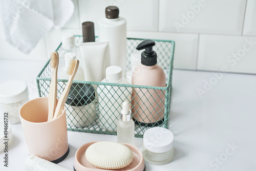 Bath accessories. Dressing table. Cosmetics and hygiene products. Spa and beauty salon. Toothbrush and soap, cream containers © Aleksandr