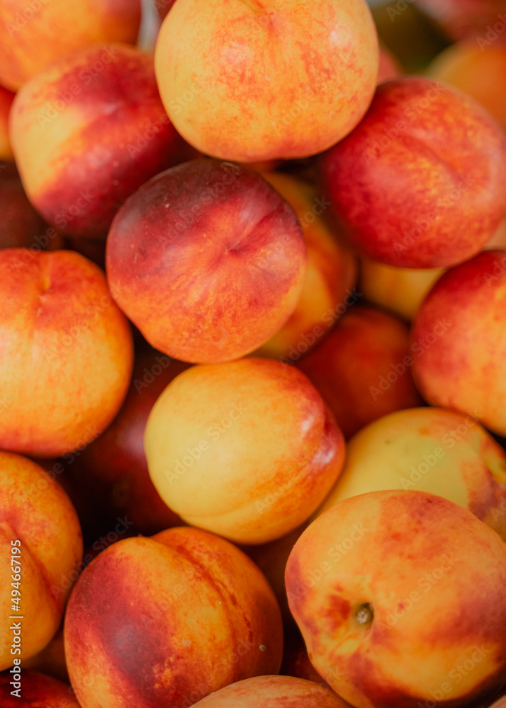 fruit texture from above, ripe red nectarine, top view, counter, harvest fruit texture from above, ripe red nectarine, top view, counter, harvest