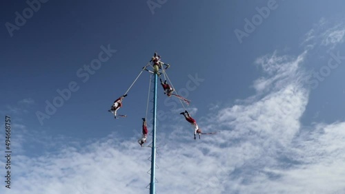 Ancient Ritual of Voladores de Papantla in Playa del Carmen Mexico photo