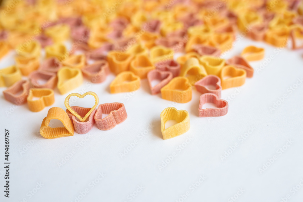 background, carbohydrate, closeup, concept, cooking, Pasta hearts shaped . Top view on white background. Diet, love and foot concept . Copy space. Dried pasta in heart shape. background, carbohydrate, closeup, concept, cooking, Pasta hearts shaped . Top view on white background. Diet, love and foot concept . Copy space. Dried pasta in heart shape.