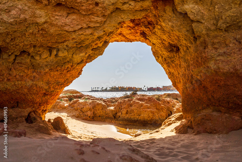 Beautiful sandstone arch with view on marina in Portimao  Ferragudo  Algarve  Portugal